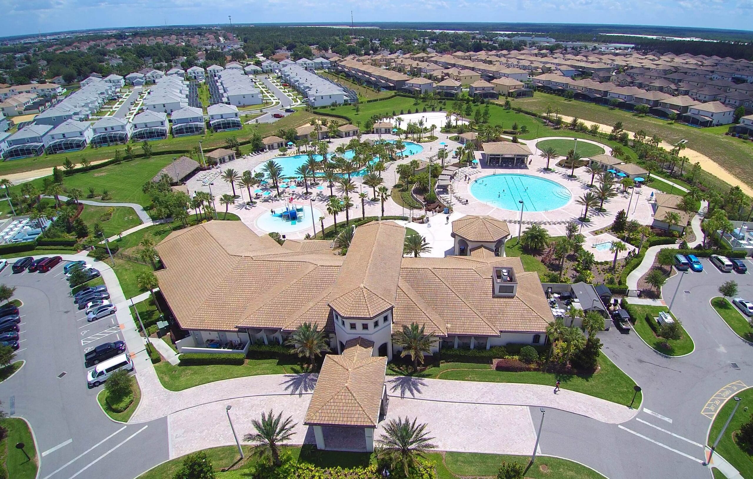 Aerial view of Champions Gate Resort clubhouse pools and recreation areas near Disney